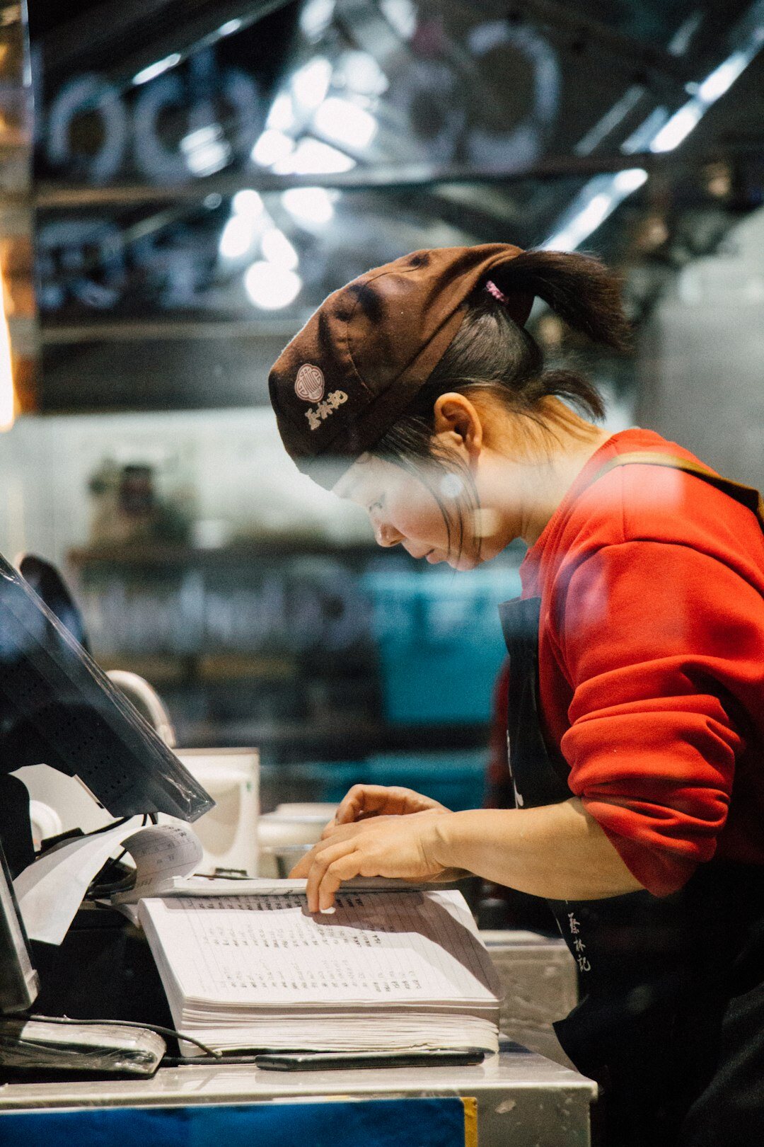 Modern newsroom office with journalists working at desks